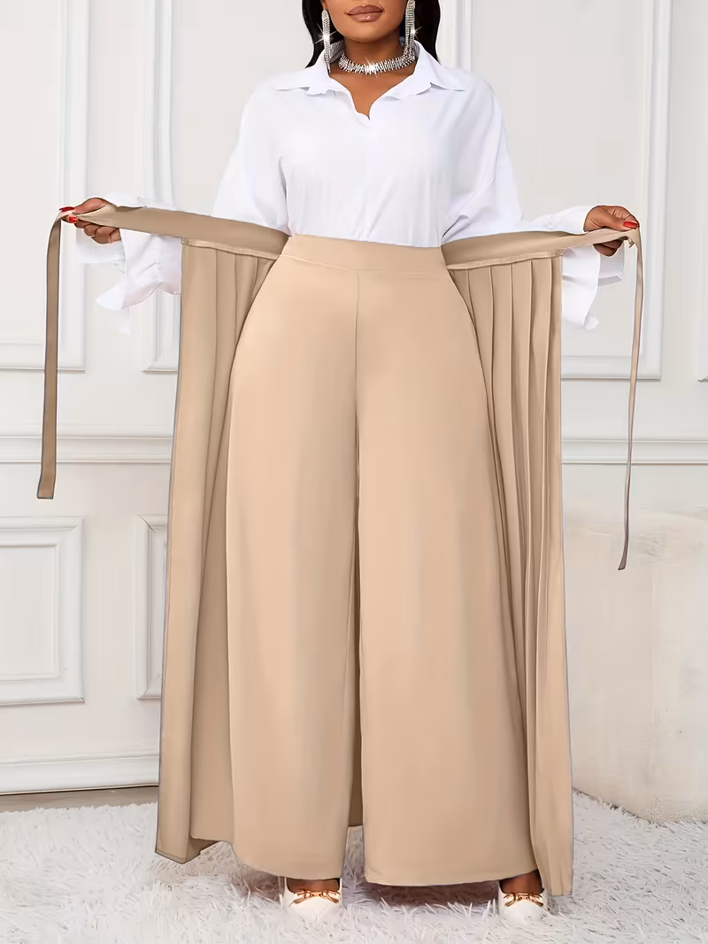 Femme en tailleur pantalon sur mesure